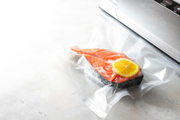 Salmon fillets in a vacuum package. Sous-vide, new technology cuisine.