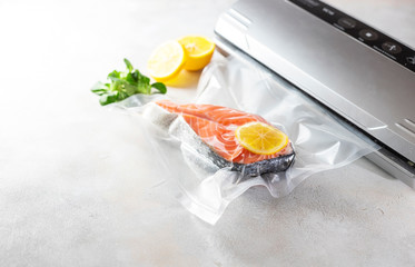 Salmon fillets in a vacuum package. Sous-vide, new technology cuisine.
