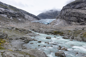 Nigardsbreen glacier river view. Norway mountains