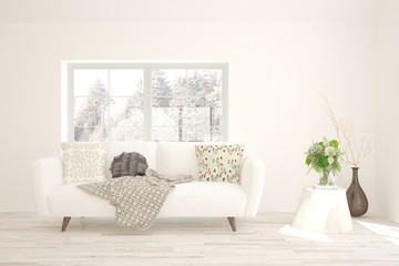 Fototapeta premium Stylish room in white color with sofa. Scandinavian interior design. 3D illustration