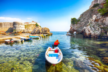 Fort Bokar and Fort Lovrijenac on a sunny day with boats on sea