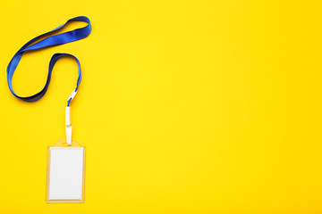 Blank white bagde on yellow background