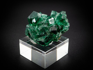 natural green fluorite mineral on black background