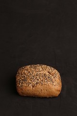 delicious bread rolls on colored background