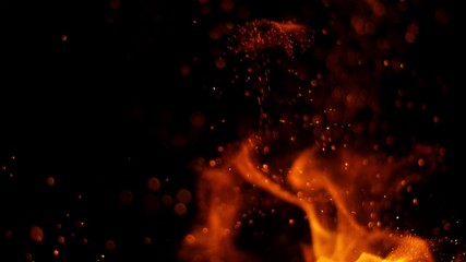 Super slow motion of fire sparks isolated on black background. Filmed on high speed camera, 1000 fps