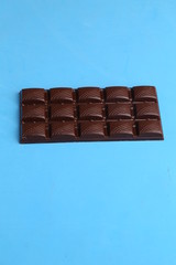 milk chocolate tablet in color background