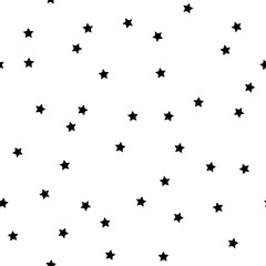Vector seamless pattern with stars in a chaotic manner. Simple design for wrapping, wallpaper, textile
