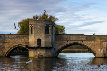 River Great Ouse with the medieval St Leger Chapel Bridge at St Ives, Cambridgeshire, England, UK.