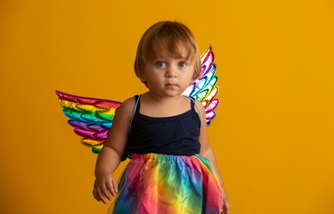 Cute cupid on yellow background. Happy Valentine's Day. Children's Day. Carnival. Matinee.