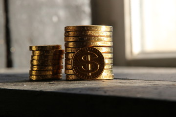 graph of gold coins on vintage background