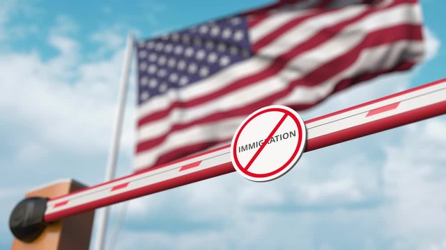 Closing boom barrier with stop immigration sign against the American flag. Border closure or immigration ban in the USA