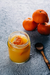 Homemade orange juice on bluish background. Copy space. Top view