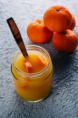 Homemade orange juice on bluish background. Copy space. Top view