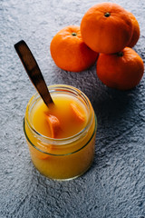 Homemade orange juice on bluish background. Copy space. Top view