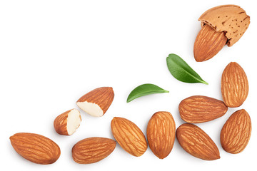 Almonds nuts with leaves isolated on white background with clipping path and full depth of field. Top view with copy space for your text. Flat lay
