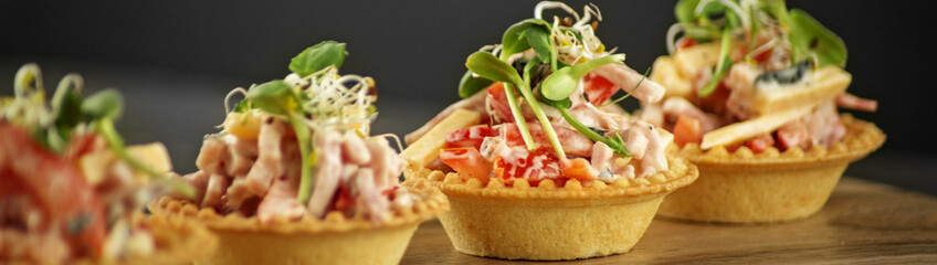 Tasty hearty appetizers with meat and vegetables and microgreen. Concept of food, restaurant, catering