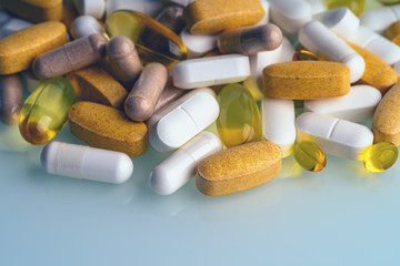 Medicaments, pill capsules, drugs and dietary supplements macro photo close up. Medication treatment concept.