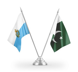 Pakistan and San Marino table flags isolated on white 3D rendering