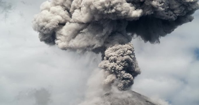 Mushroom cloud forming after a violent volcanic eruption. Reventador volcano erupting in February 2020, The mountain is situated in a remote part of the Ecuadorian Amazon. Time lapse.