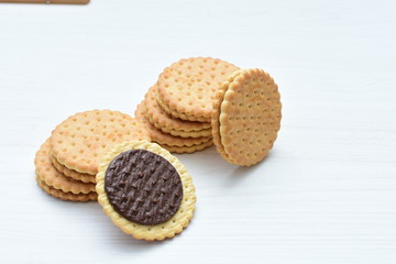  Chocolate cookies displayed on light background