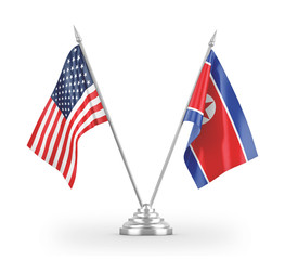 North Korea and United States table flags isolated on white 3D rendering