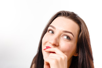 Fototapeta premium Business young beautiful lady on a white background shows different emotions copy space