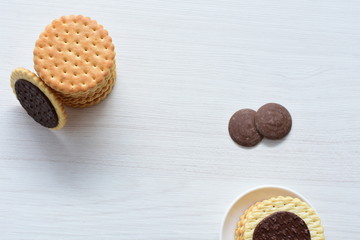  Chocolate cookies displayed on light background