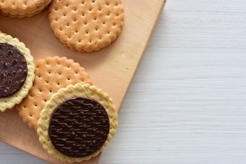  Chocolate cookies displayed on light background
