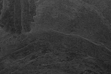Dark grey black slate background or texture. © peekeedee