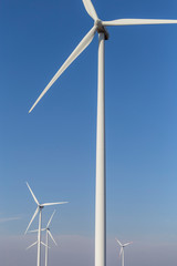 Fototapeta premium Wind turbine spinning for renewable electricity production