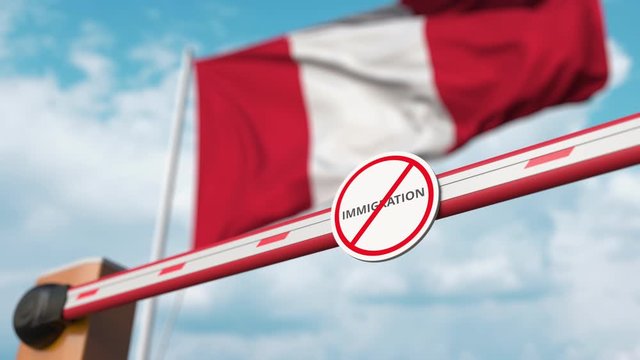 Closing boom barrier with stop immigration sign against the Peruvian flag. Border closure or immigration ban in Peru