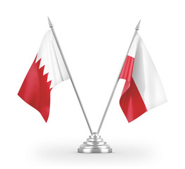 Poland and Bahrain table flags isolated on white 3D rendering