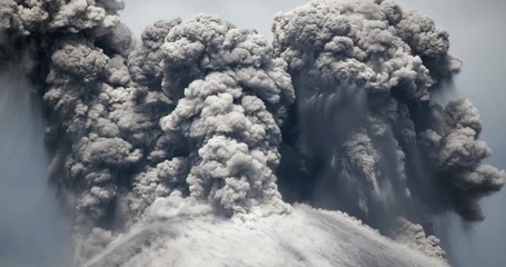 Spectacular volcanic eruption. Huge boulders are thrown from the ash cloud. Reventador volcano erupting in February 2020, situated in a remote part of the Ecuadorian Amazon surrounded by rainforest.