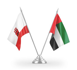 United Arab Emirates and Gibraltar table flags isolated on white 3D rendering