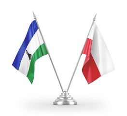 Poland and Lesotho table flags isolated on white 3D rendering