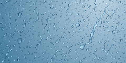 Background with drops and streaks of water in light blue colors, flowing down the surface