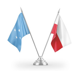 Poland and Micronesia table flags isolated on white 3D rendering