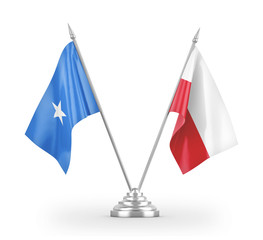 Poland and Somalia table flags isolated on white 3D rendering