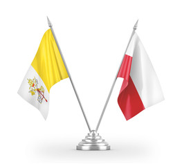 Poland and Vatican table flags isolated on white 3D rendering