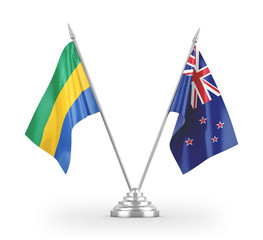 New Zealand and Gabon table flags isolated on white 3D rendering