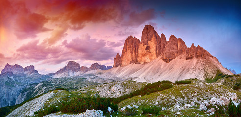 Amazing view of The Three Peaks of Lavaredo (Tre Cime di Lavaredo) at sunset. Trentino Alto Adidge,...