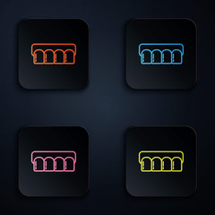 Color neon line Dentures model icon isolated on black background. Teeth of the upper jaw. Dental concept. Set icons in square buttons. Vector Illustration © Oksana
