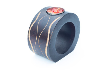 Brown wooden candlestick on a white background