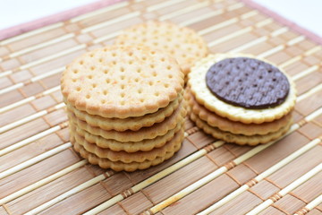 Chocolate cookies displayed on light background