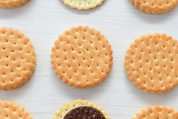 Chocolate cookies displayed on light background