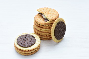 Chocolate cookies displayed on light background