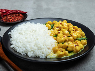 rice, chickpeas with coconut milk and curry. vegetarian dish