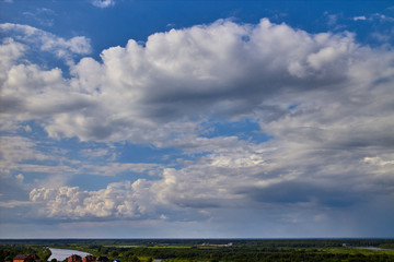 Blue aerial landscape on light background. Empty background scene. Panoramic view. Sky blue background. Urban scene. Sunny day, blue sky. Wide angle. Wide panorama. Aerial view. Sky clouds.