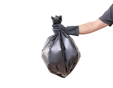 Hand Holding Trash Bag Isolated On White Background, Clipping Path