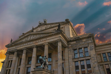 Fototapeta na wymiar Front view of Konzerthaus, Berlin with dramatic sunset sky, nobody